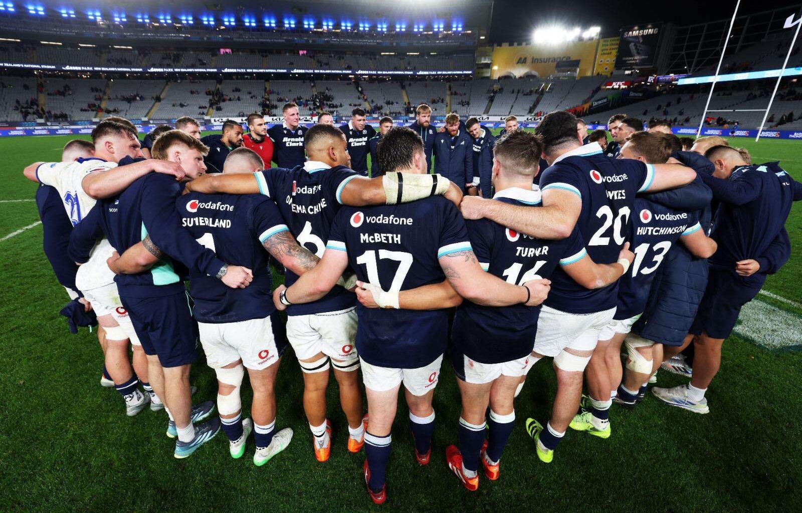 The Scotland squad debrief on the pitch after their victory over Samoa at Eden Park. Image: SNS / Scottish Rugby