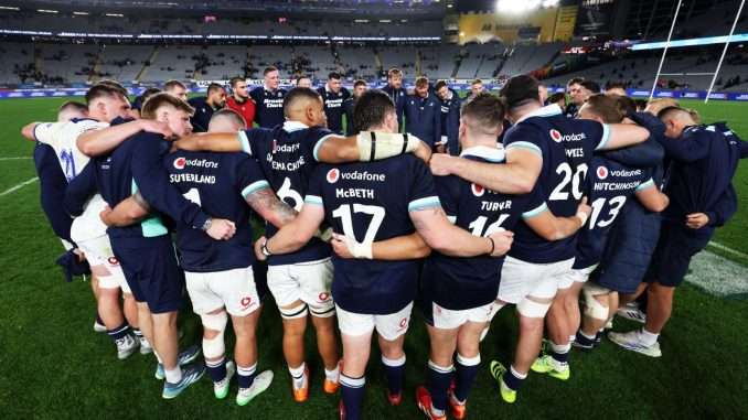 The Scotland squad debrief on the pitch after their victory over Samoa at Eden Park. Image: SNS / Scottish Rugby