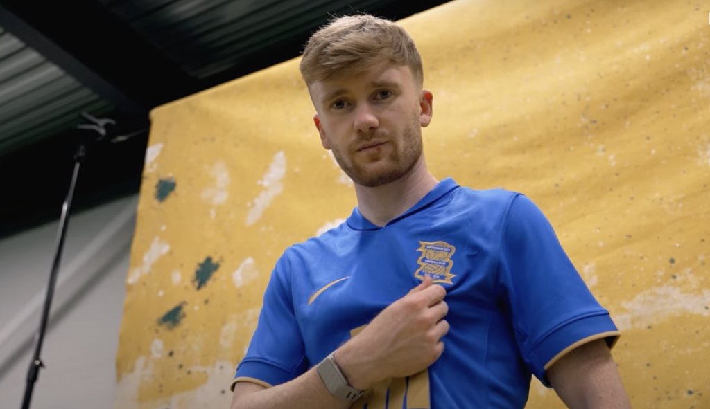 Tommy Doyle poses with the Birmingham City shirt after completing his loan move from Wolverhampton Wanderers