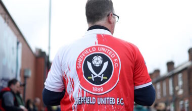 A Sheffield United fan makes his way to the match