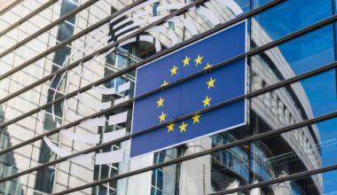 The symbol of the European Parliament on the glass façade of the European Parliament.