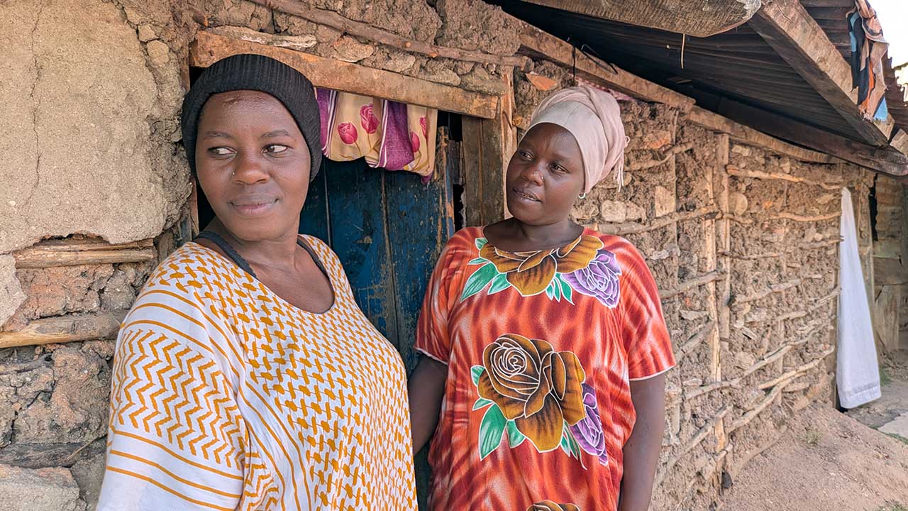 Two women standing side by side.