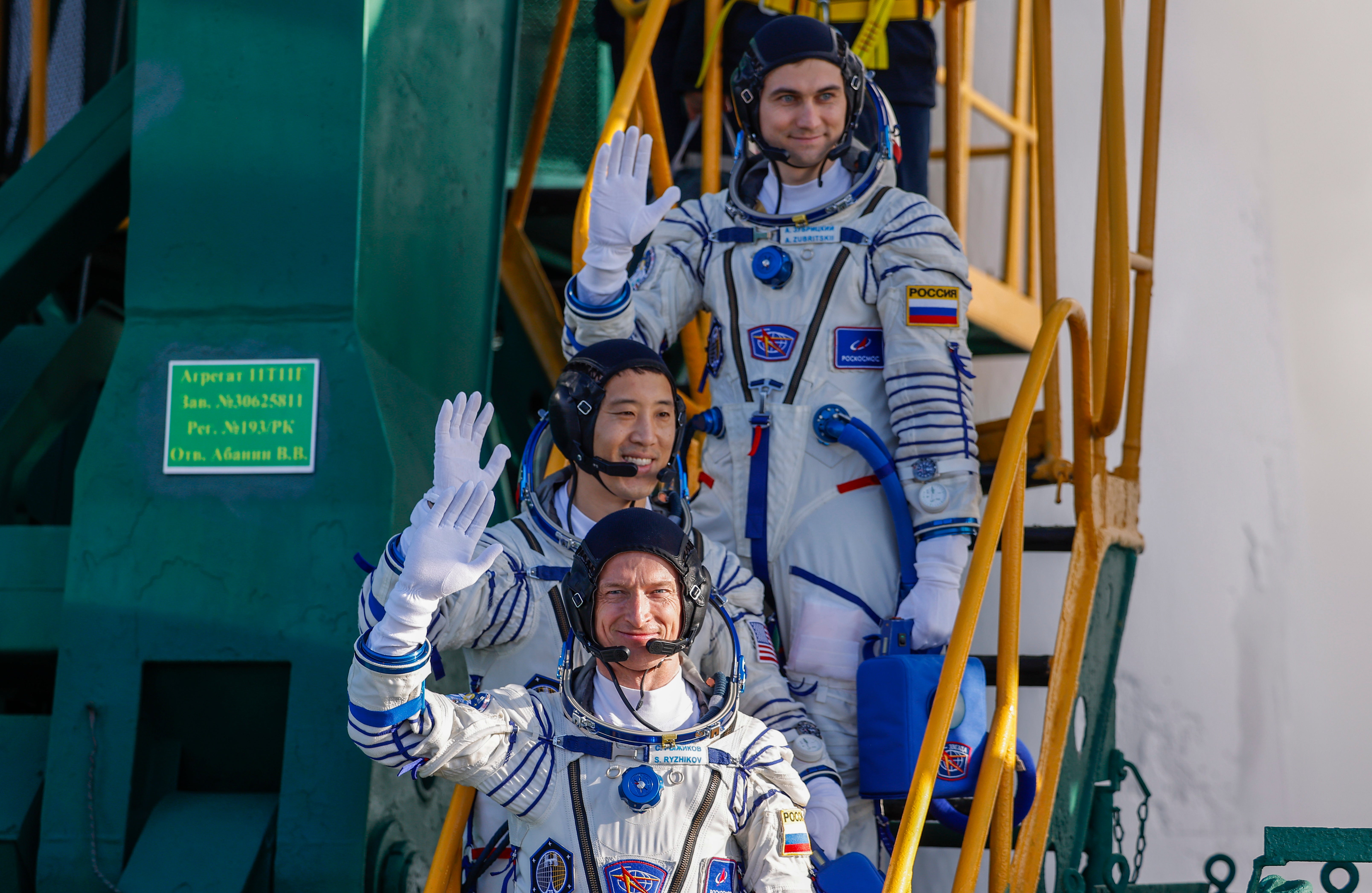 International Space Station crew members Nasa astronaut Jonny Kim (middle) and Roscosmos cosmonauts Sergey Ryzhikov (bottom) and Alexey Zubritskiy (top) board the Soyuz MS-27 spacecraft for launch at the Baikonur Cosmodrome in Baikonur, Kazakhstan, in April this year