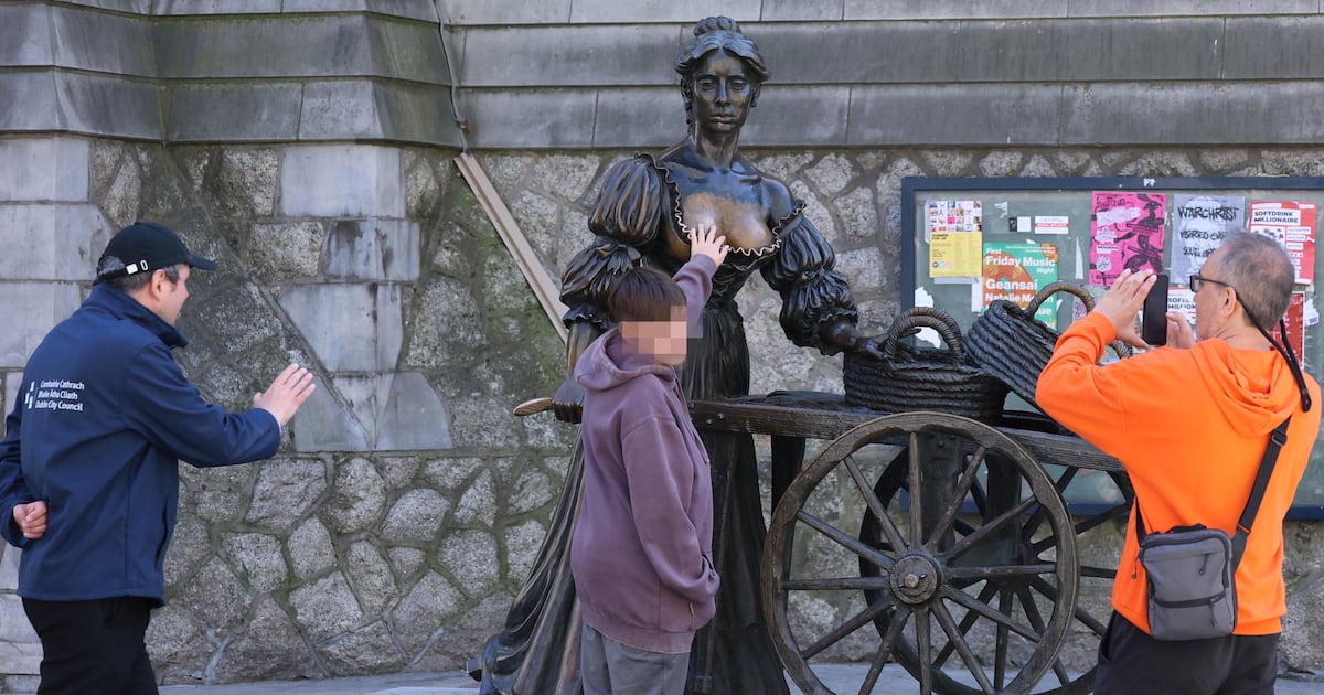 Flower-bed barriers to be placed around Molly Malone statue to discourage tourists from touching breasts – The Irish Times