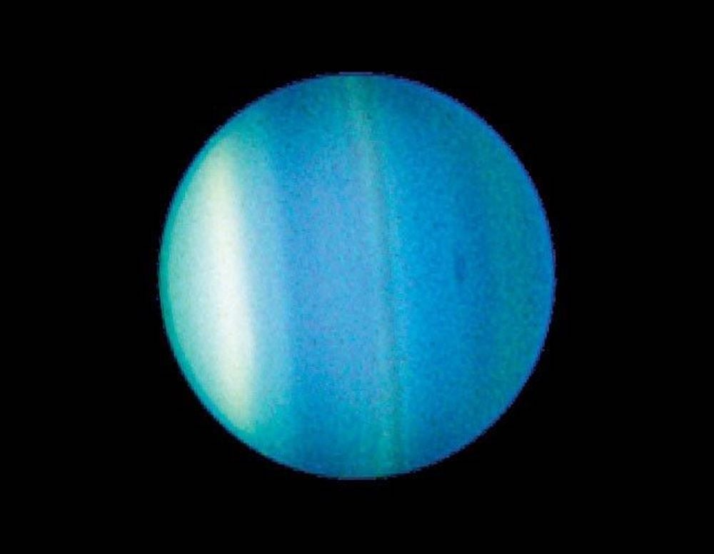 Image of Uranus from the Hubble Space Telescope shows bands and a new dark spot in Uranus' atmosphere. (Credit :  NASA/Space Telescope Science Institute)
