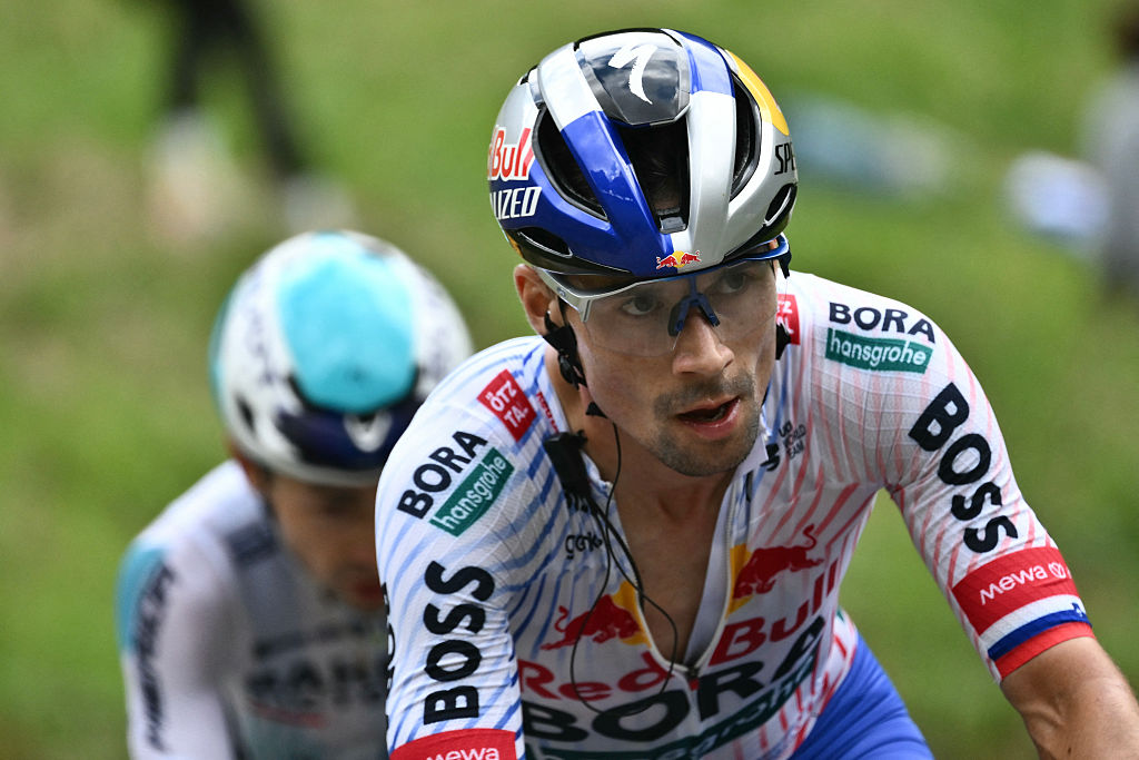 Red Bull - BORA - hansgrohe team's Slovenian rider Primoz Roglic cycles in the ascent of Col du Pre during the 19th stage of the 112th edition of the Tour de France cycling race, 93.1 km between Albertville and La Plagne, in the French Alps, on July 25, 2025. The 19th stage of the Tour de France was shorted from its initial 129.9 km route, bypassing the Col des Saisies where an outbreak of nodular dermatitis in a herd of cattle was discovered, prompting organizers to modify the race route. (Photo by Marco BERTORELLO / AFP) (Photo by MARCO BERTORELLO/AFP via Getty Images)