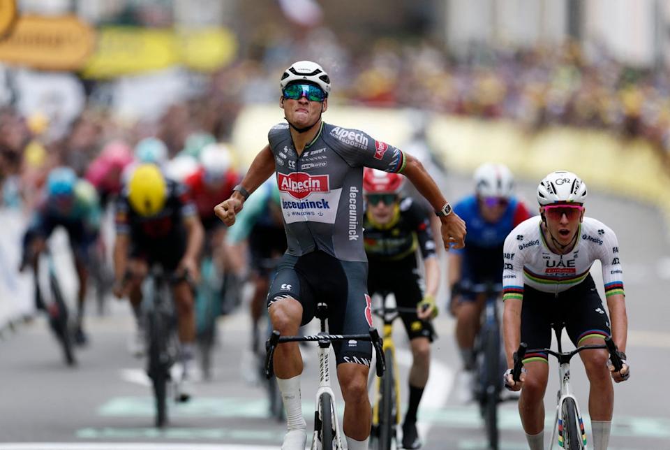 Mathieu van der Poel took the win in stage 2 of the Tour de France in a thrilling finish ahead of Tadej Pogacar (REUTERS)