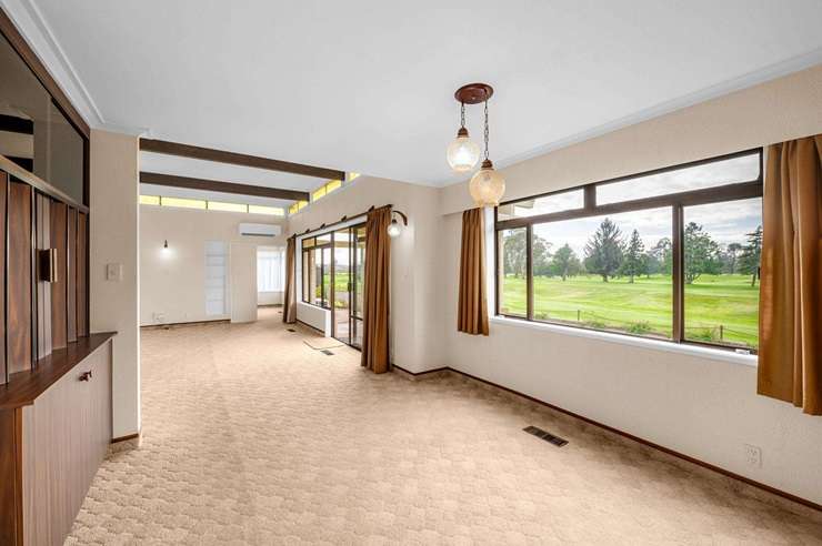 A two-bedroom home, in a rare spot beside St Andrews Course, in Hamilton, has sold under the hammer for <img.36m after an auction scrap. Photo / Supplied