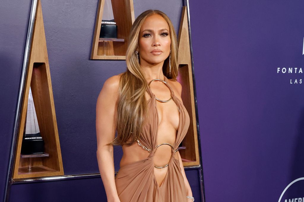 jennifer lopez in plunging brown dress american music awards