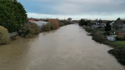 The Forty Foot Drain in flood. A large amount of flood water can be seen. 