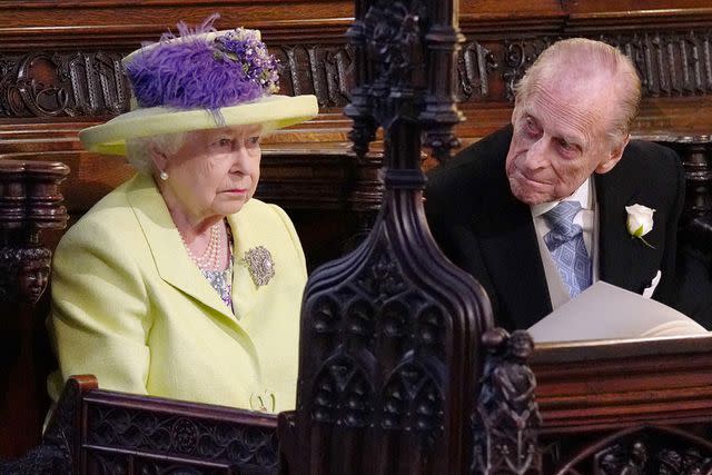 JONATHAN BRADY/POOL/AFP via Getty Queen Elizabeth and Prince Philip at Prince Harry and Meghan Markle's wedding at St. George's Chapel at Windsor Castle on May 19, 2018.
