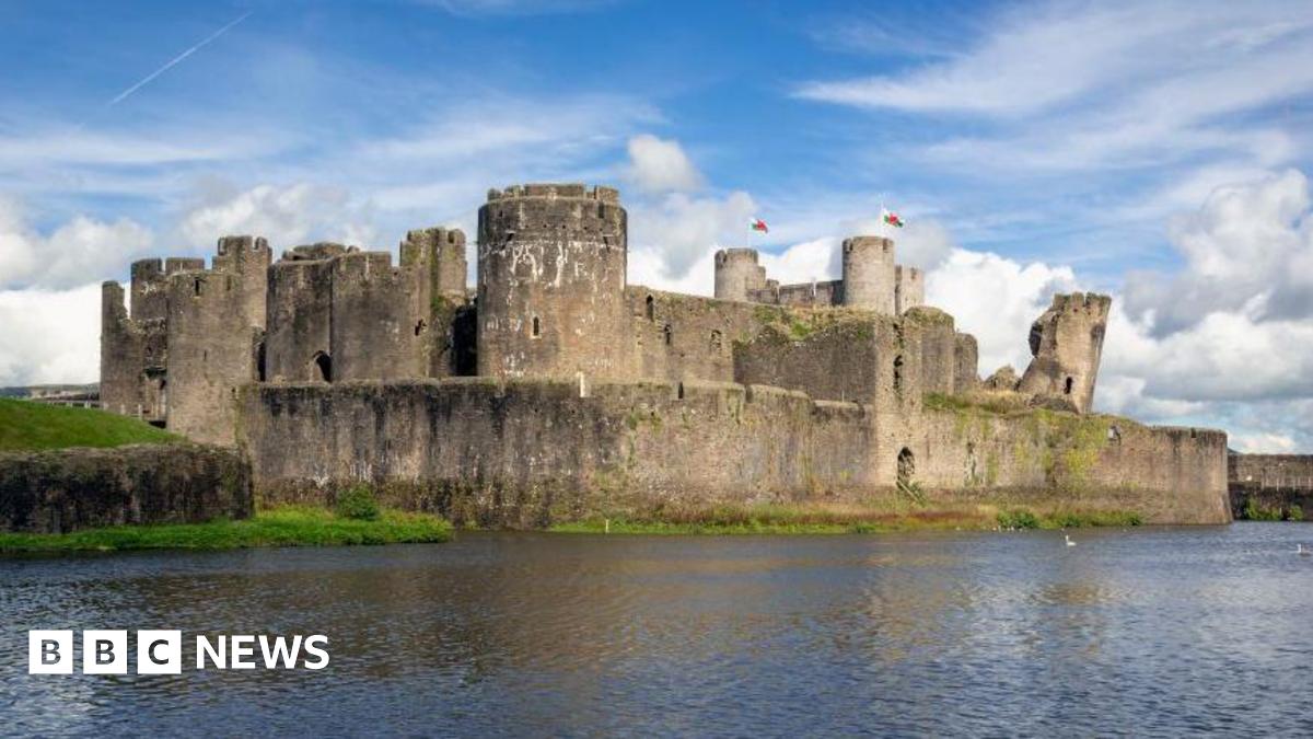 The outside of Caerphilly Castle, which has a large moat running outside it