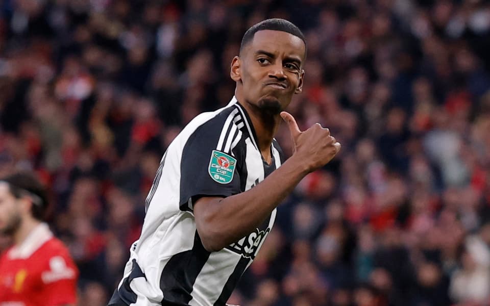 Alexander Isak celebrates doubling Newcastle's lead against Liverpool in the Carabao Cup final