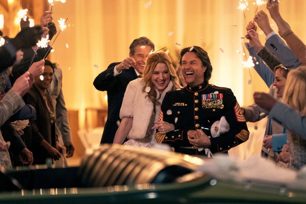 alexandra breckenridge and martin henderson in a wedding celebration with sparklers in virgin river season 6