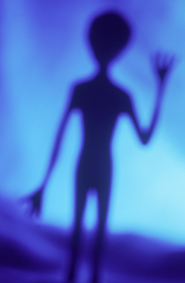 Blurred image of an alien waving.