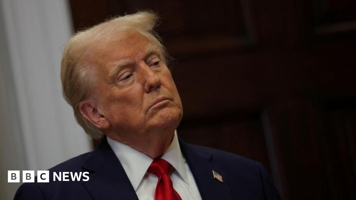 President Donald Trump looks on during a press conference about AI in January