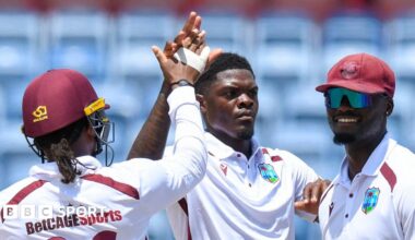 West Indies bowler Alzarri Joseph (centre) celebrates taking a wicket
