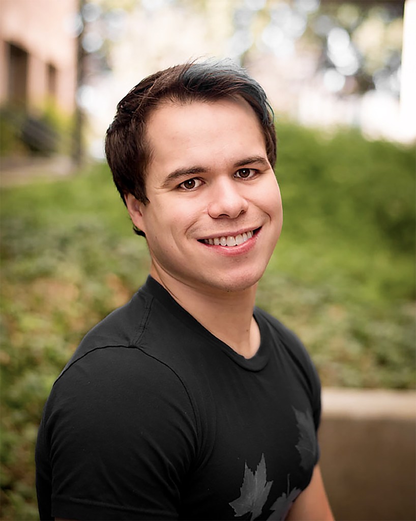Portrait of biochemist Chris Rhodes.