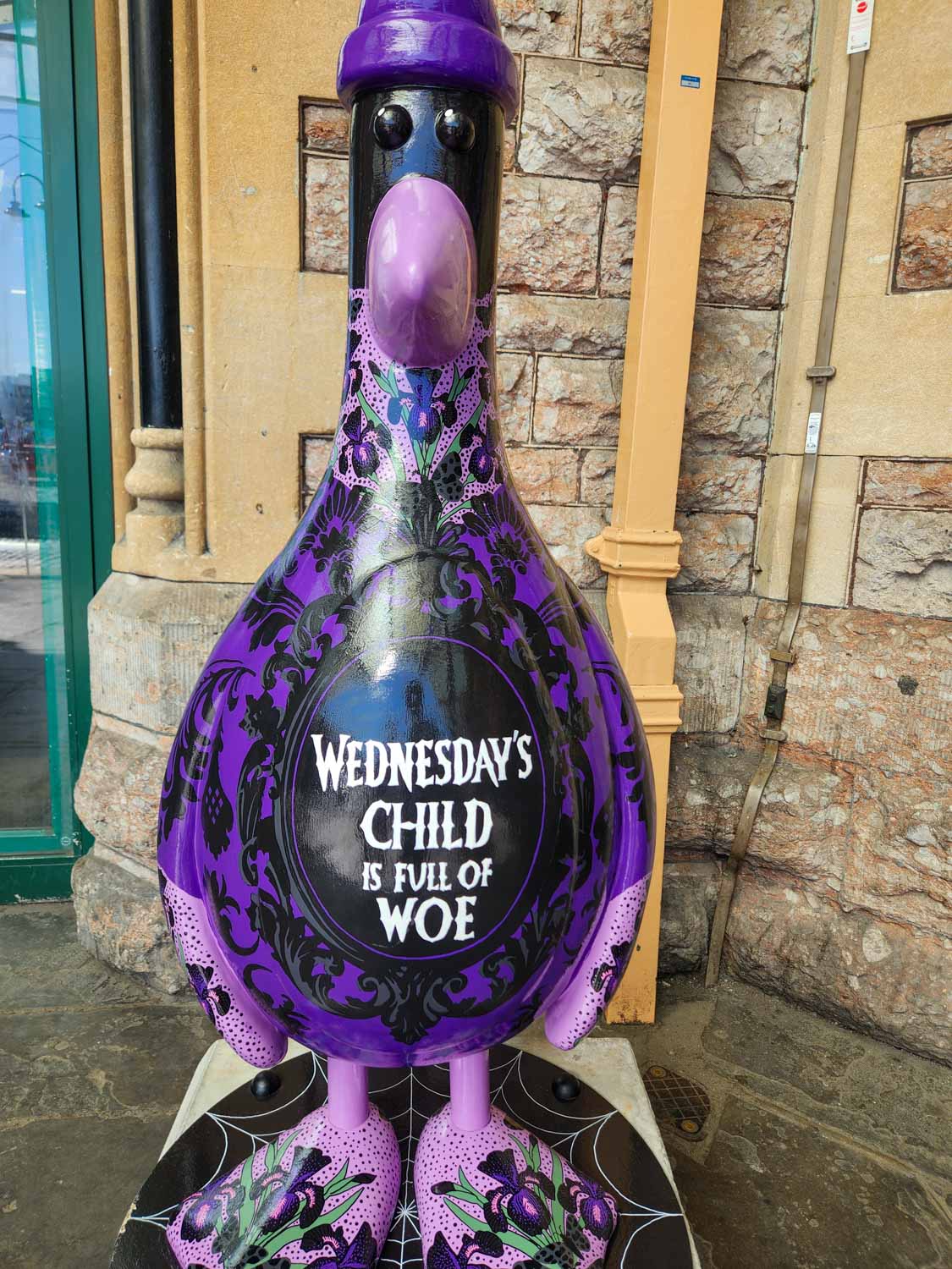 Purple and Black statue of Feathers McGraw called Wednesday at Bristol Temple Meads station - my review of Gromit Unleashed 3 trail