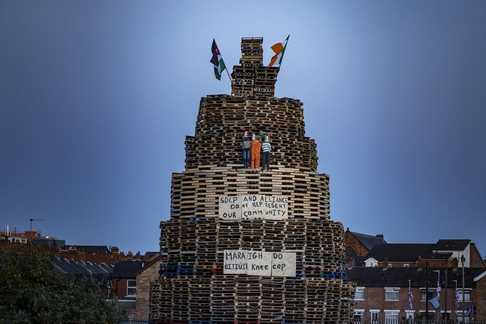 Kneecap effigy and writing appears on a bonfire in the Roden Street area of Belfast on July 11th 2025 (Photo by Kevin Scott)