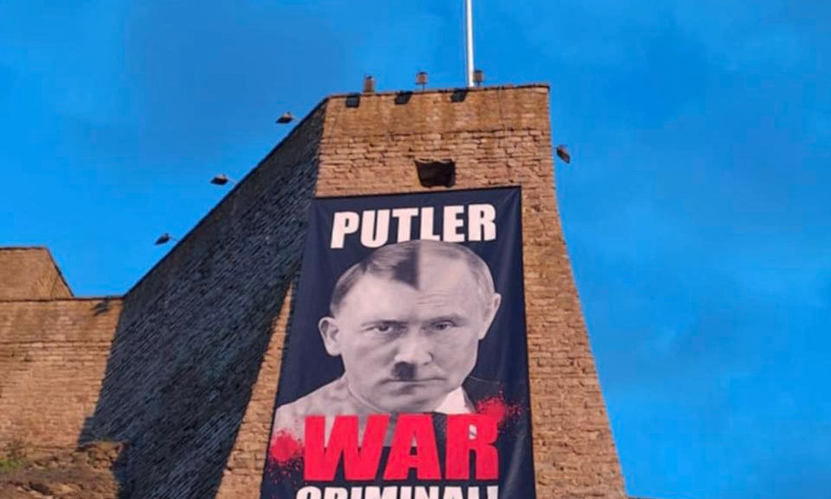 Russia charges Estonian museum director with ‘rehabilitating Nazism’ over Putin-Hitler banner - The Art Newspaper