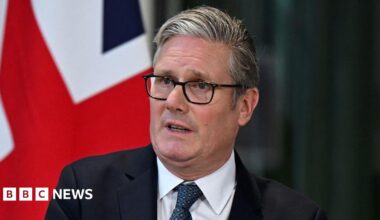 Prime Minister Keir Starmer during a joint press conference, with a union jack flag in the background