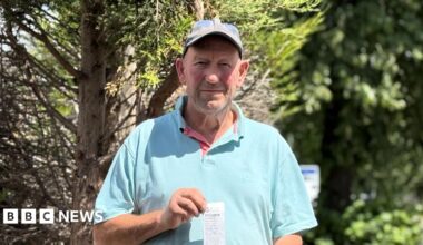 Frank Brown holding the fixed penalty notice