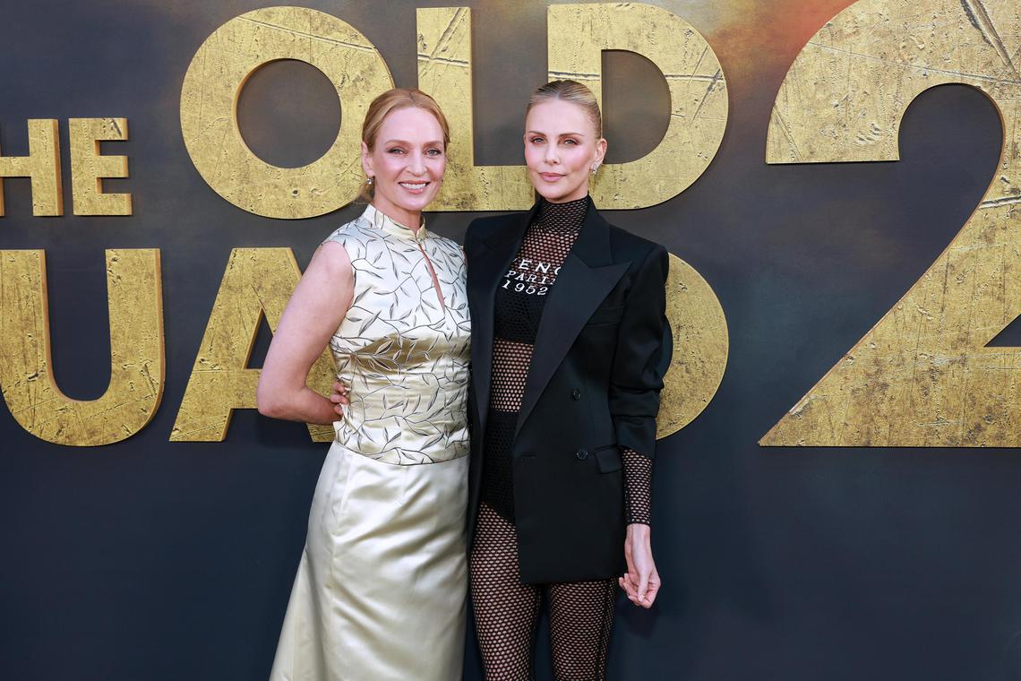 LOS ANGELES, CALIFORNIA - JUNE 25: (L-R) Charlize Theron and Uma Thurman attend Netflix's premiere of "The Old Guard 2" at Netflix Tudum Theater on June 25, 2025 in Los Angeles, California. (Photo by Matt Winkelmeyer/Getty Images for Netflix)