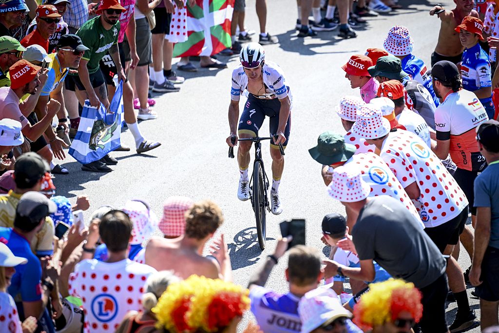 Belgian Remco Evenepoel of Soudal Quick-Step pictured in action during stage 12 of the 2025 Tour de France cycling, from Auch to Hautacam (181 km), on Thursday 17 July 2025 in France. The 112th edition of the Tour de France starts on Saturday 5 July in Lille, France, and will finish in Paris, France on the 27th of July. BELGA PHOTO POOL VINCENT KALUT (Photo by POOL VINCENT KALUT / BELGA MAG / Belga via AFP)