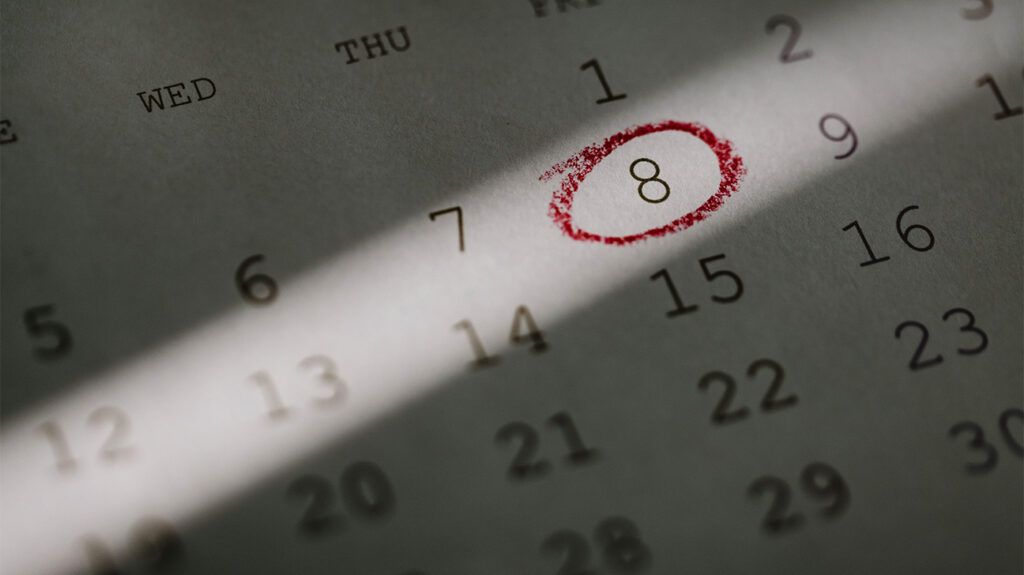 calendar page with eighth day circled in red