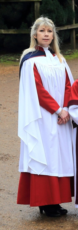 Claire E. Stewart, Director of Music, wearing choir robes.