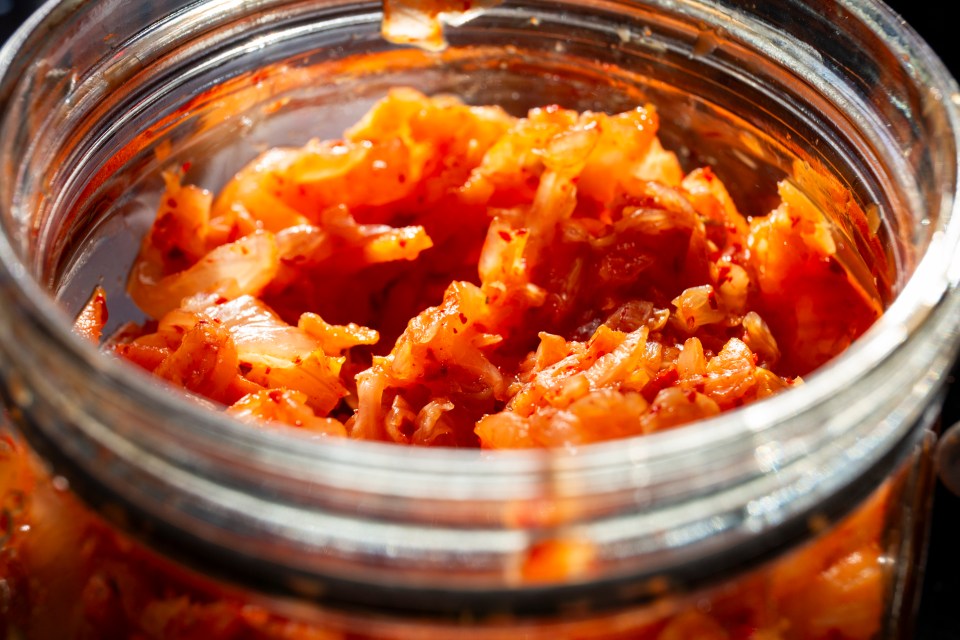 Kimchi in a glass jar.