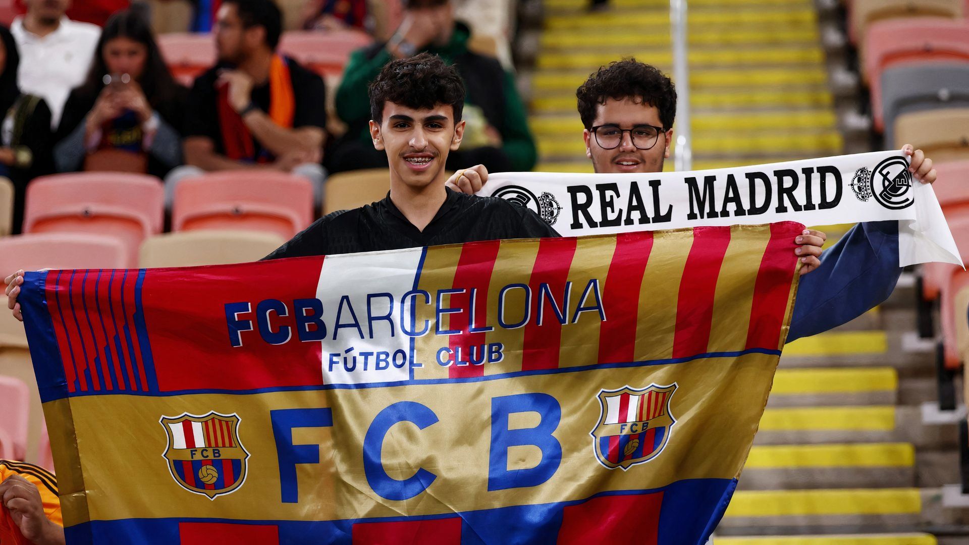 Real Madrid and Barcelona supporters