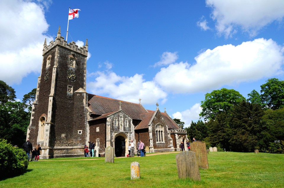 St Mary Magdalene Church in Sandringham, Norfolk, with the St George's flag flying.