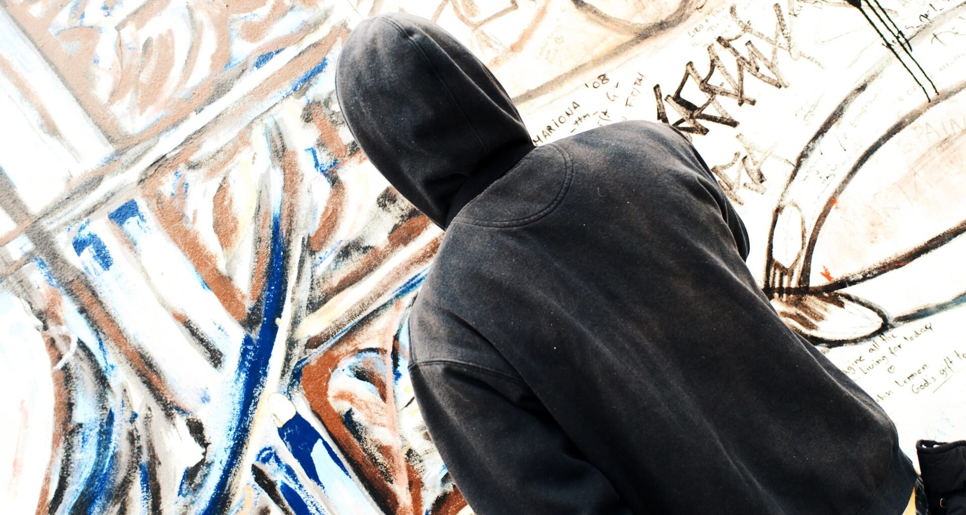Mystery 'Suffolk Banksy' artist known as 'The Hat' who leaves pictures outside cafes and pubs 'identified by fans'