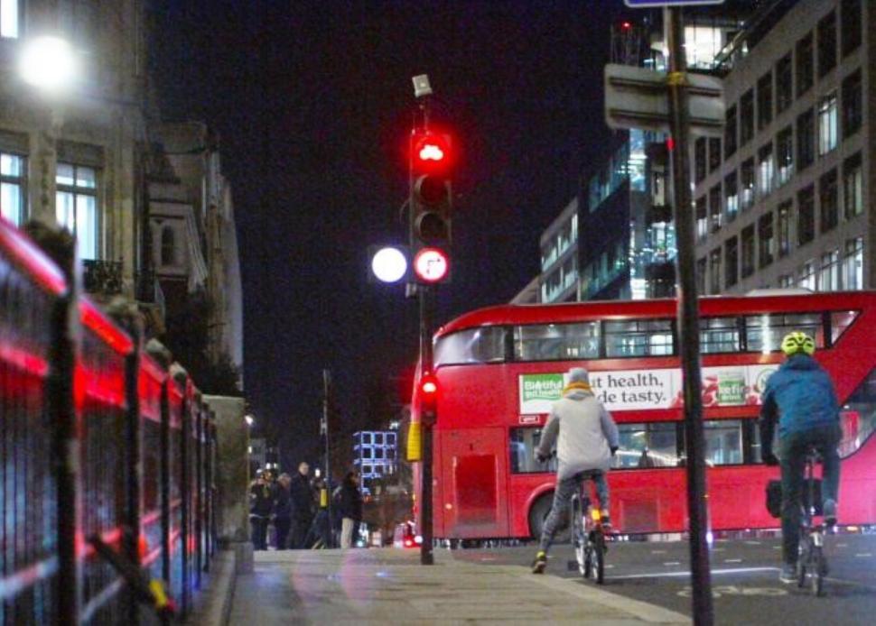 Cyclists stopped at red light in London 