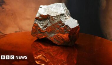 A grey-coloured Mars rock sits on podium