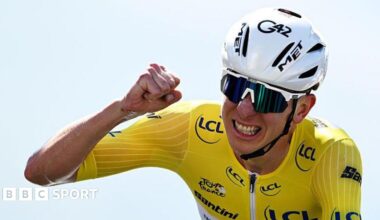 Tadej Pogacar celebrates winning stage 13 of the 2025 Tour de France