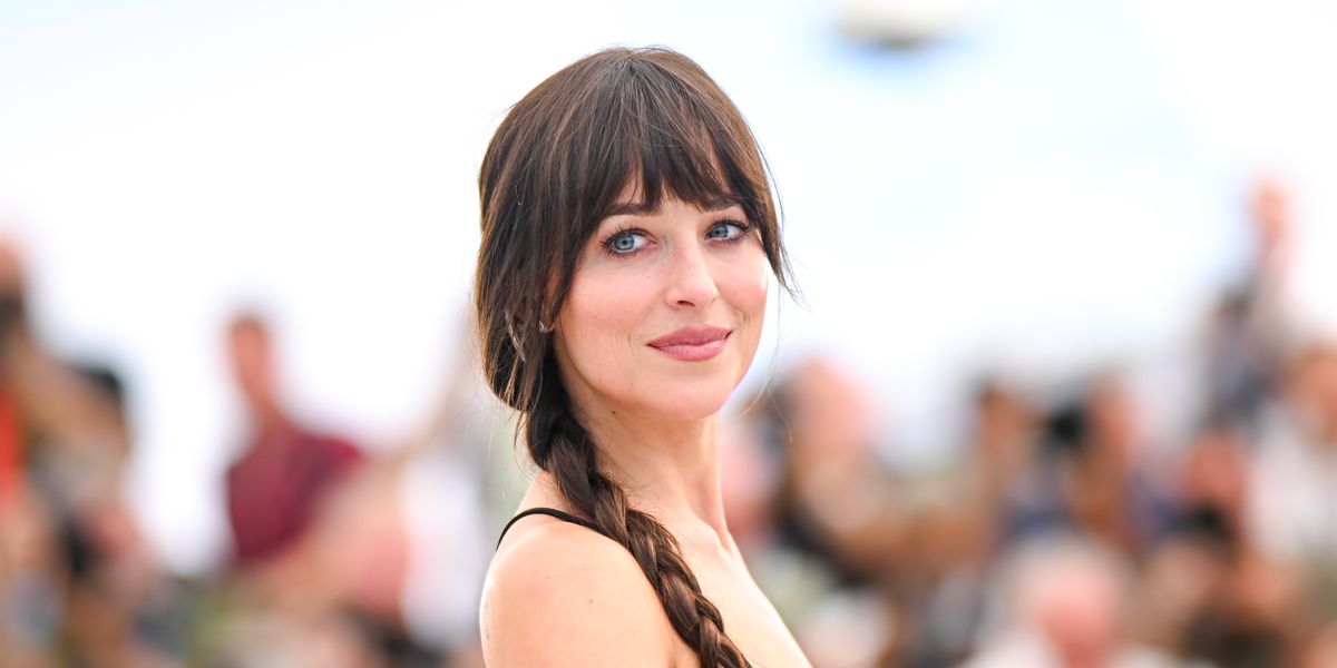 Dakota Johnson Lounges on Yacht in White Bikini