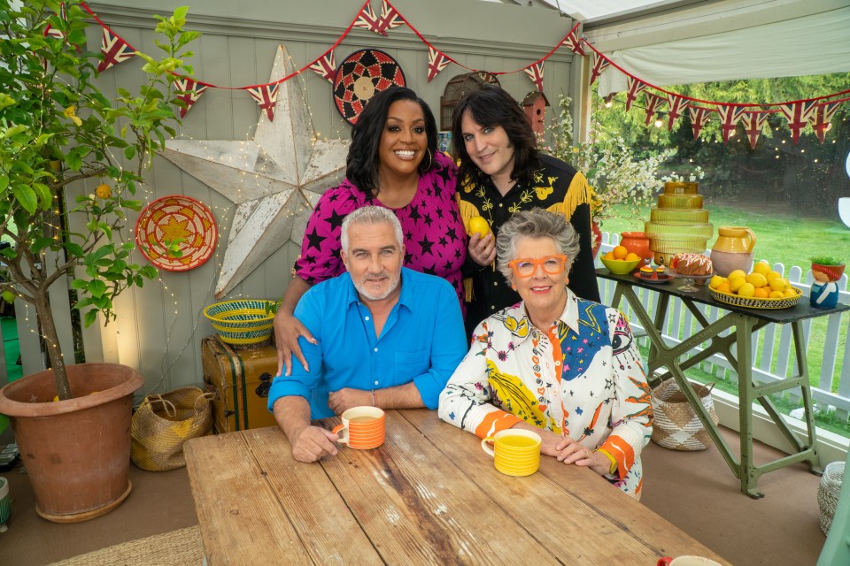 Danny Dyer, Leigh Francis, Rhod Gilbert, and Yinka Bokinni with Prue Leith and Paul Hollywood on the Great British Bake Off.