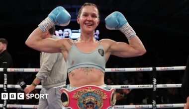 Terri Harper celebrates with her WBO belt around her waist