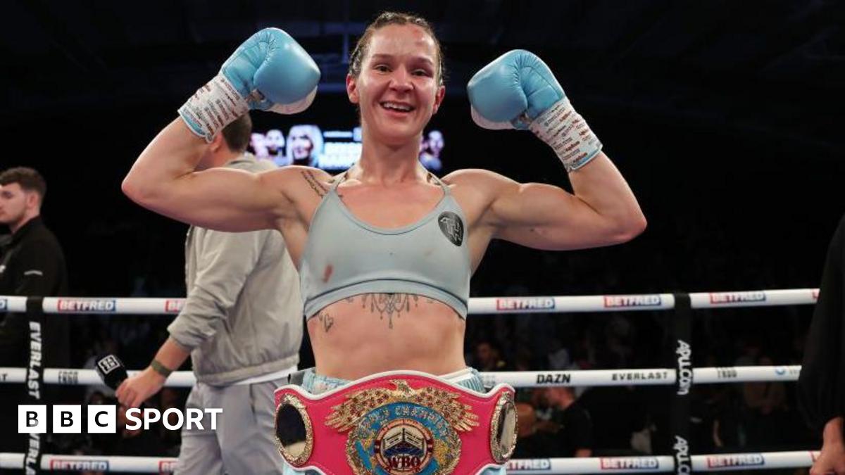 Terri Harper celebrates with her WBO belt around her waist