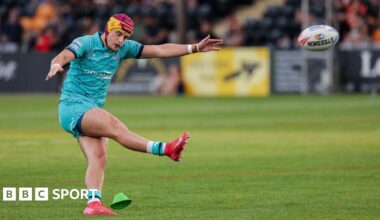 Huddersfield Giants player George Flanagan kicks a conversion against Castleford Tigers.