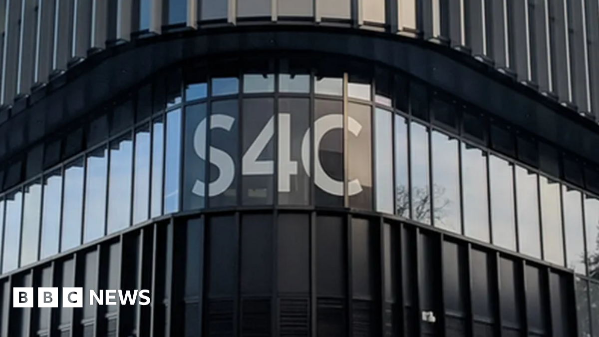 The S4C logo on the outside of its headquarters on a black building.
