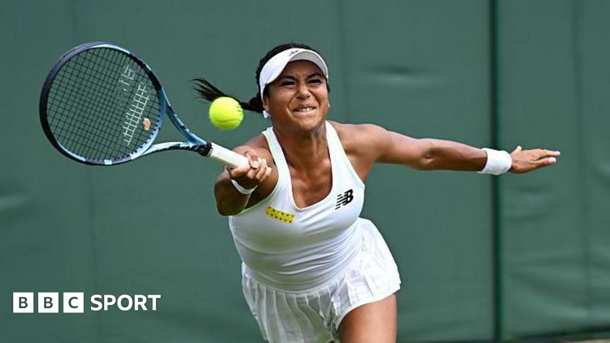 Heather Watson stretches to try and connect with a forehand