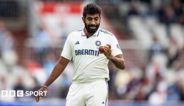 Jasprit Bumrah looks at the ball