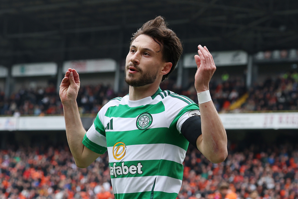 DUNDEE, SCOTLAND - APRIL 26: Nicolas Kühn of Celtic celebrates after scoring his team