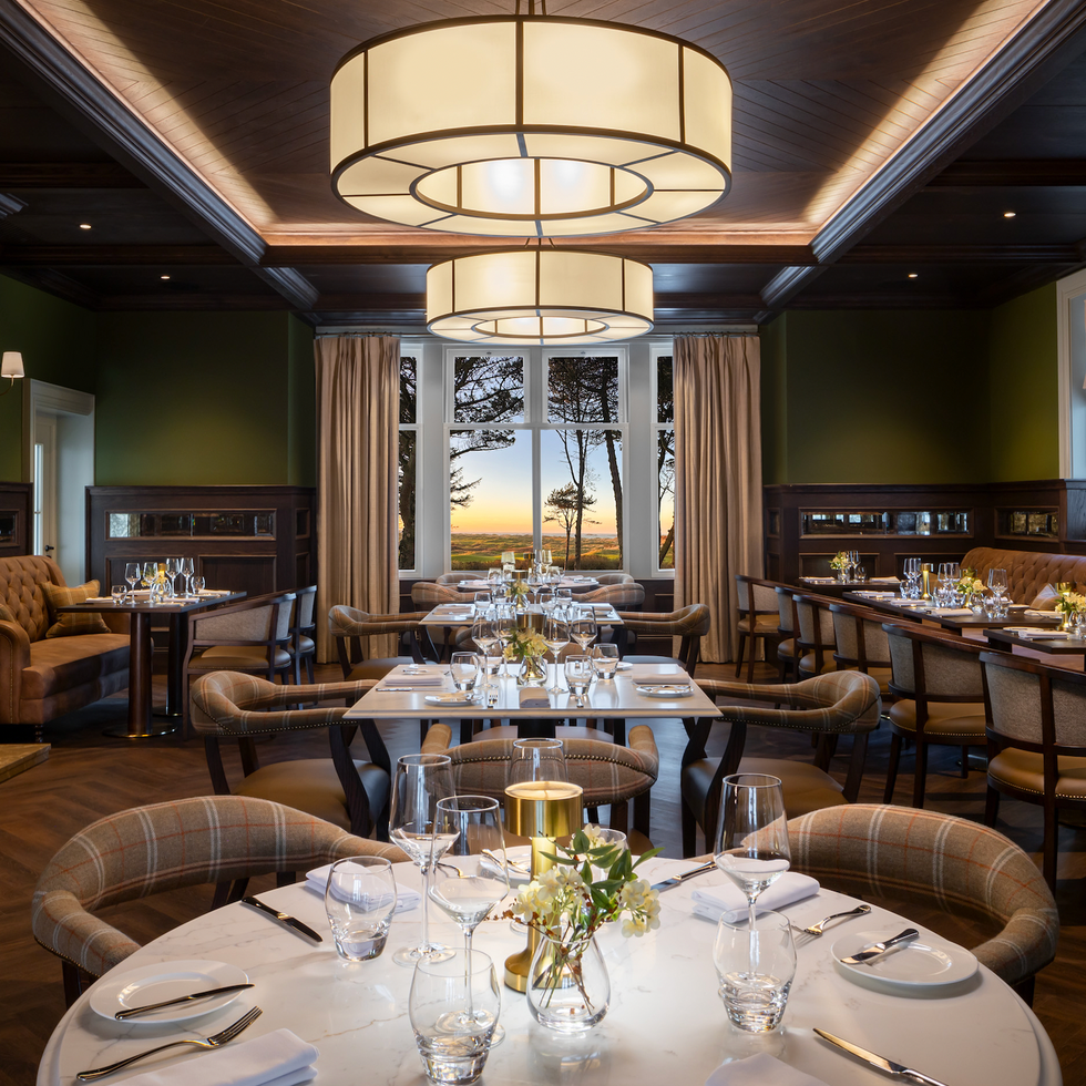 upscale dining area featuring elegant decor and table settings