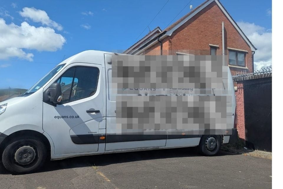 A van has been plastered with racist graffiti in west Belfast