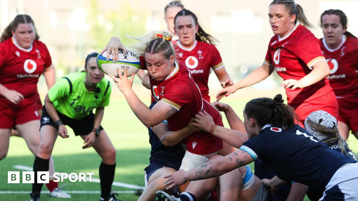 Savannah Picton-Powell powers over for one of her two tries for Wales